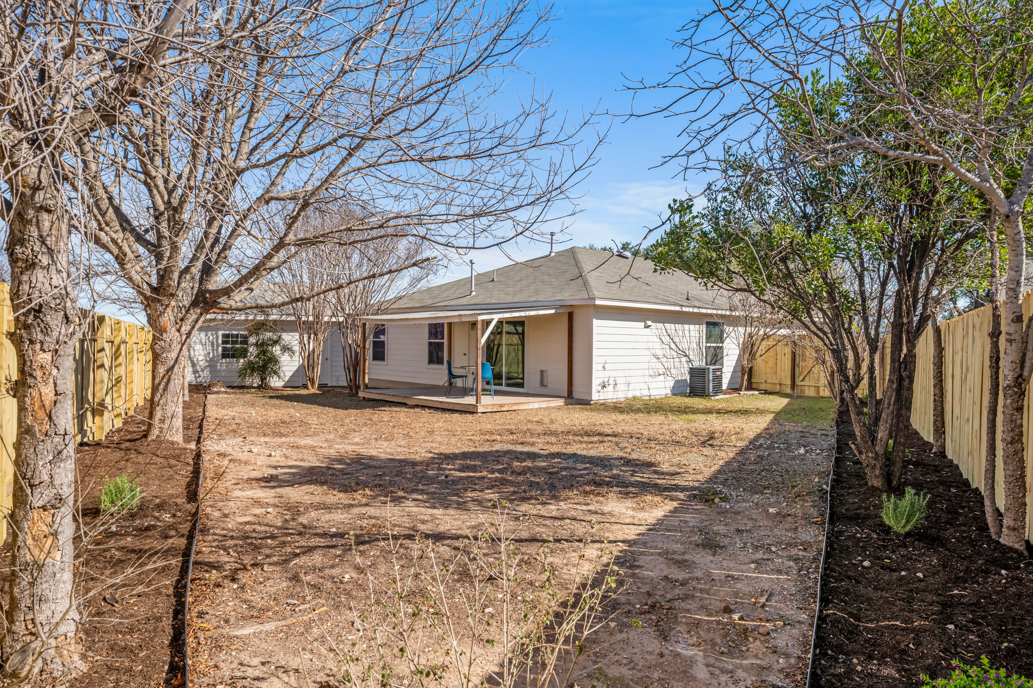 161 Segovia Way Pflugerville, TX 78660 - Photo 31 of 37 a front view of a house with a yard covered in snow