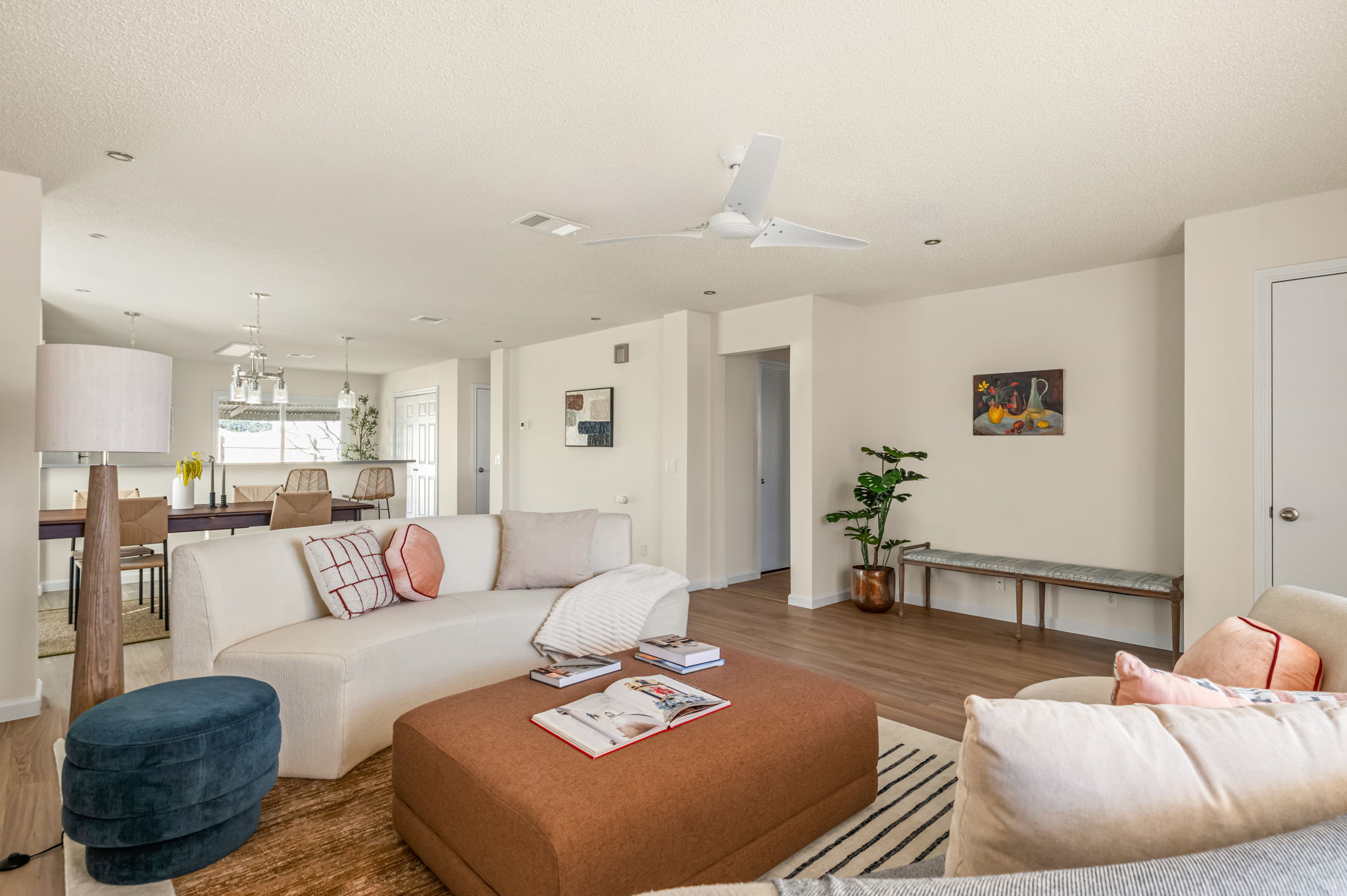 161 Segovia Way Pflugerville, TX 78660 - Photo 6 of 37 a living room with furniture and a wooden floor