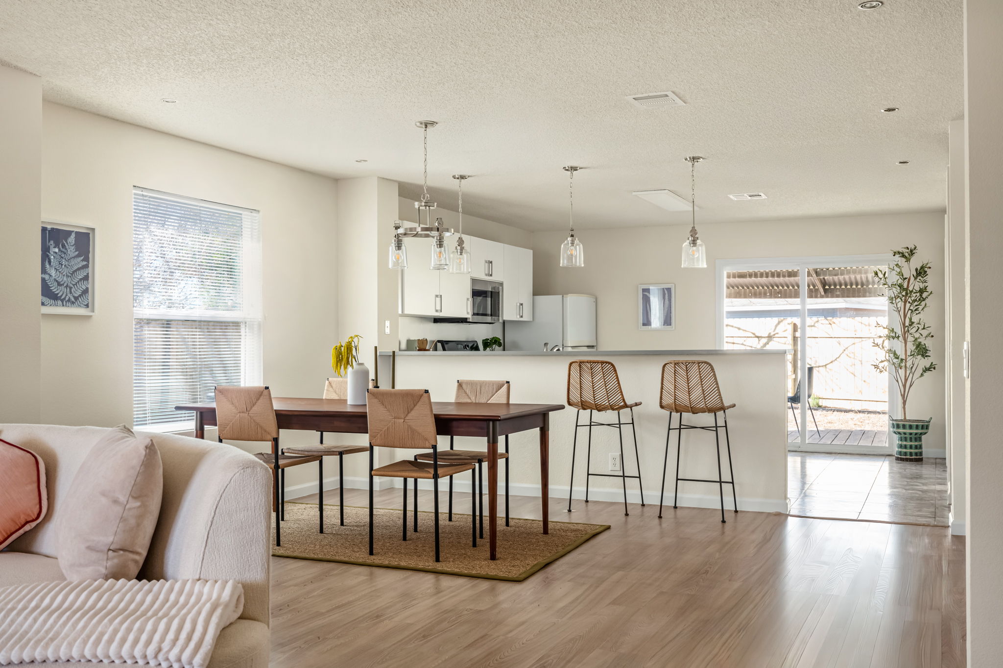 161 Segovia Way Pflugerville, TX 78660 - Photo 8 of 37 a living room with lots of furniture and kitchen view