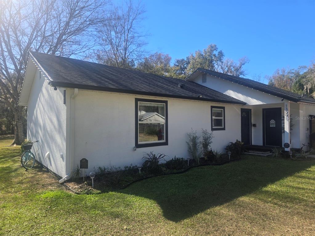 13091 Old Crystal River Road Brooksville, FL 34601 - Photo 1 of 30 a backyard of a house with lots of green space