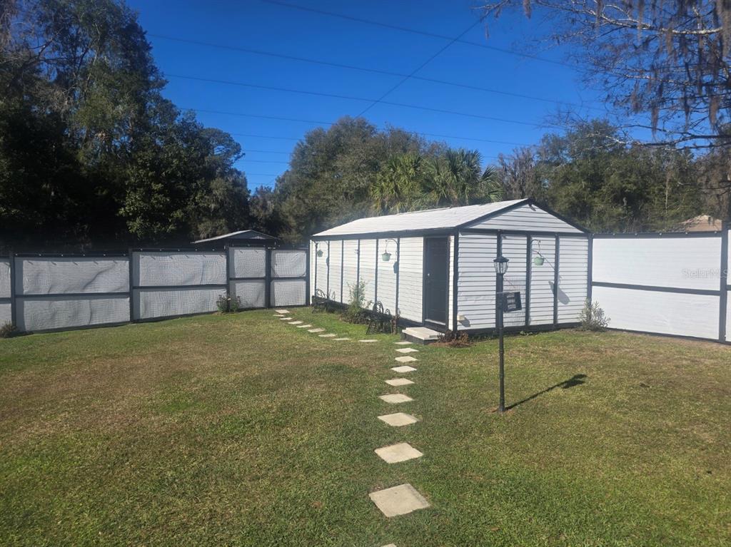 13091 Old Crystal River Road Brooksville, FL 34601 - Photo 19 of 30 a view of a backyard