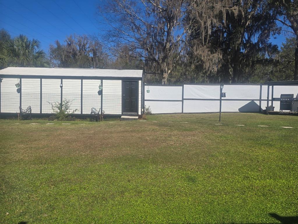 13091 Old Crystal River Road Brooksville, FL 34601 - Photo 27 of 30 a view of a yard