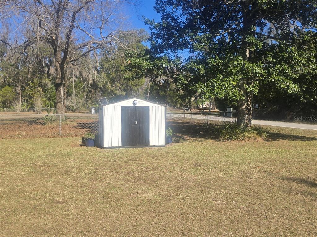 13091 Old Crystal River Road Brooksville, FL 34601 - Photo 30 of 30 a view of a yard with trees