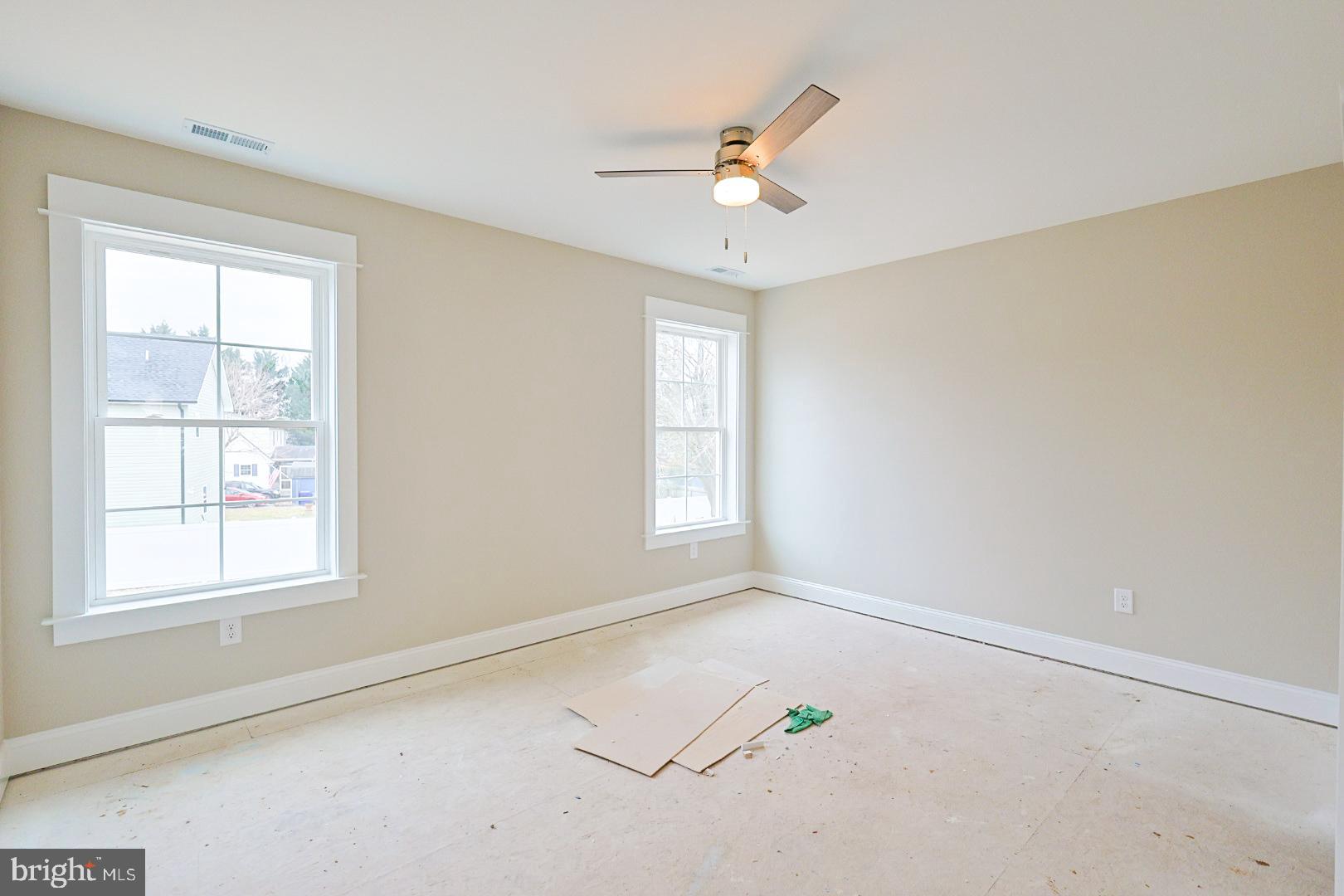 104 Front Street Frederica, DE 19946 - Photo 10 of 11 a view of an empty room with a window