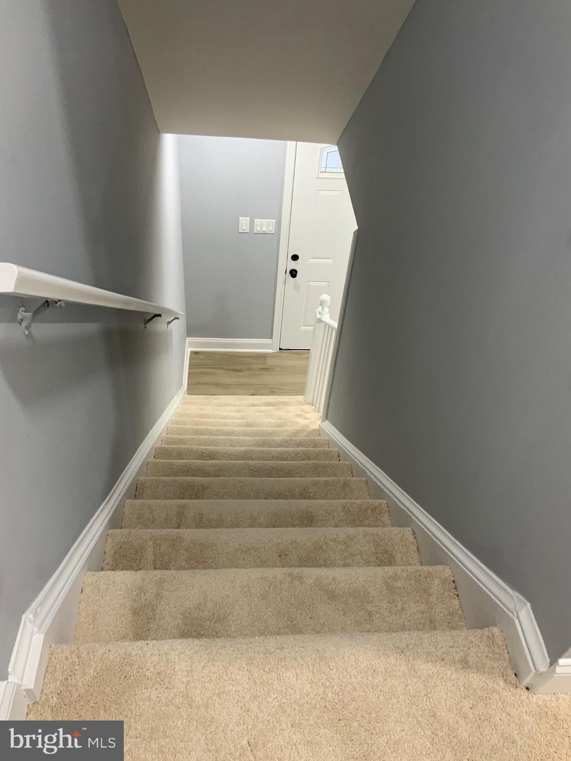 9414 Taney Road Manassas, VA 20110 - Photo 14 of 46 a view of staircase with white walls