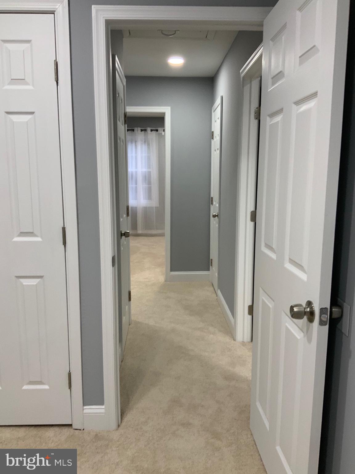 9414 Taney Road Manassas, VA 20110 - Photo 21 of 46 a view of a hallway with wooden floor