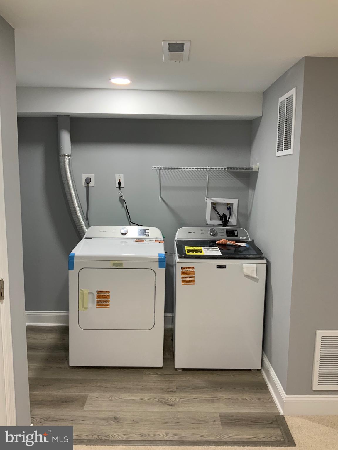 9414 Taney Road Manassas, VA 20110 - Photo 30 of 46 a utility room with washer and dryer
