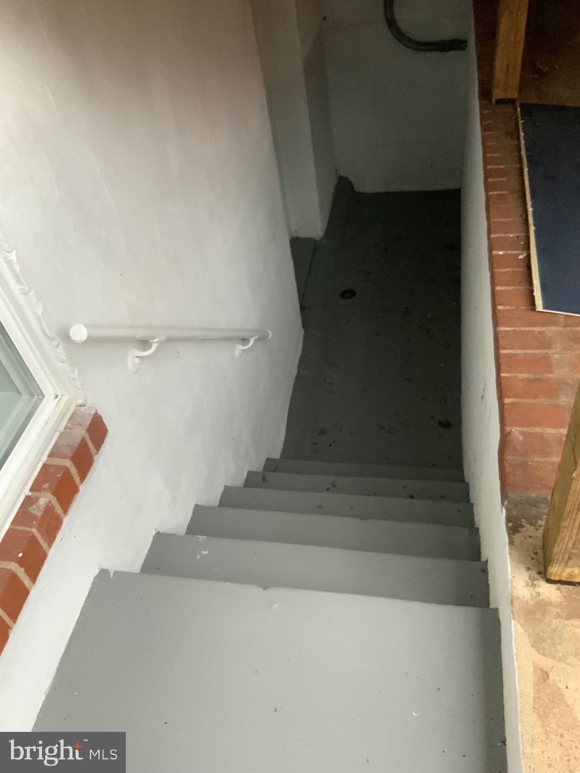 9414 Taney Road Manassas, VA 20110 - Photo 38 of 46 STAIRS TO BASMENT FROM BACK YARD