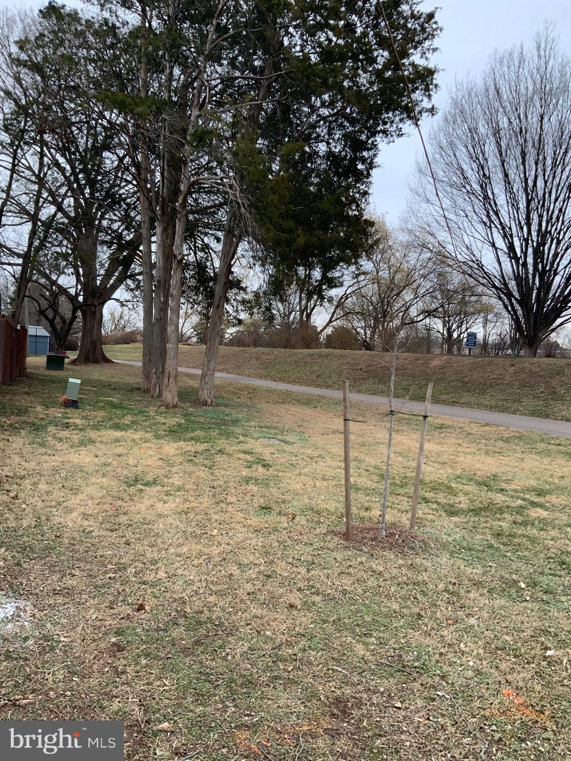9414 Taney Road Manassas, VA 20110 - Photo 42 of 46 a view of a yard with wooden fence