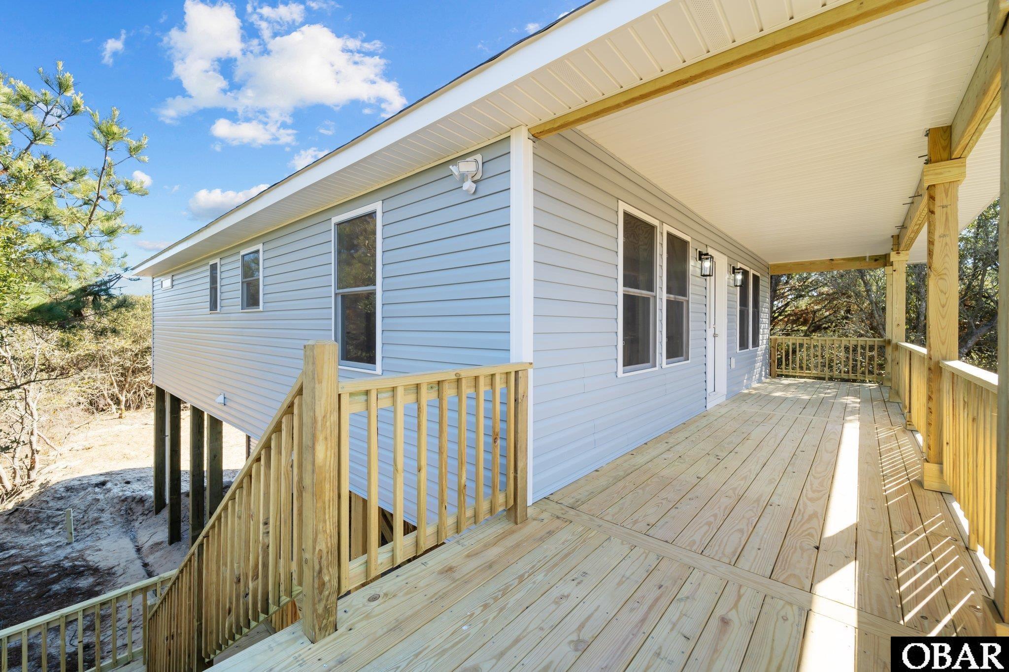 2225 Ocean Pearl Road Corolla, NC 27927 - Photo 29 of 33 BEAUTIFUL DECKING FOR SUMMER ENJOYMENT AND VIEWING