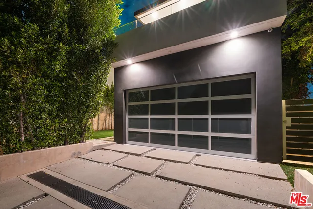 a house view with a garden space