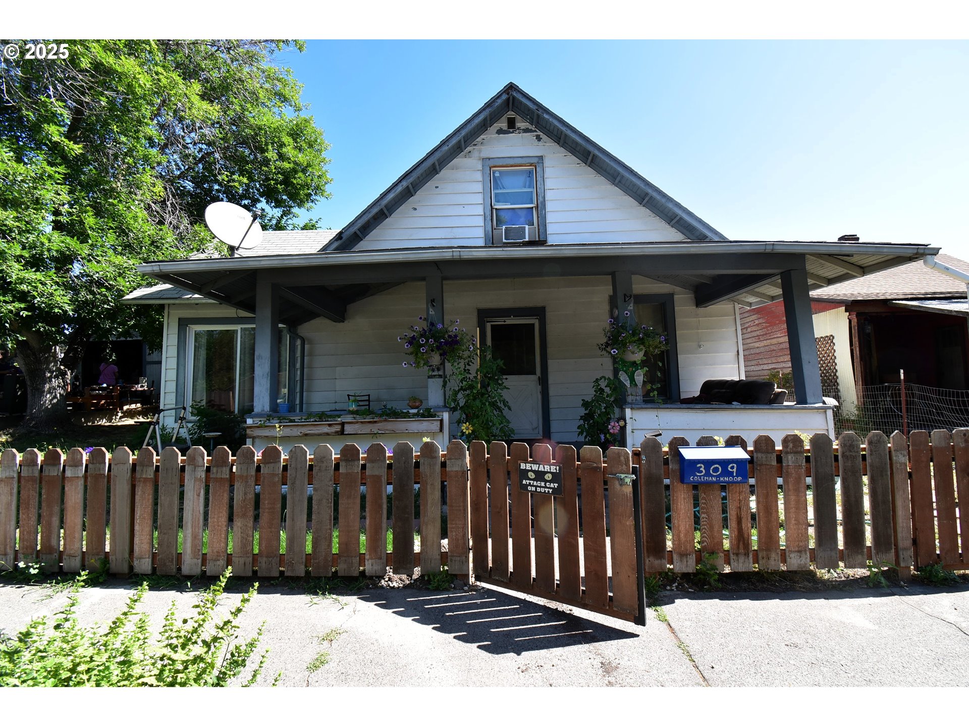 a front view of house with street