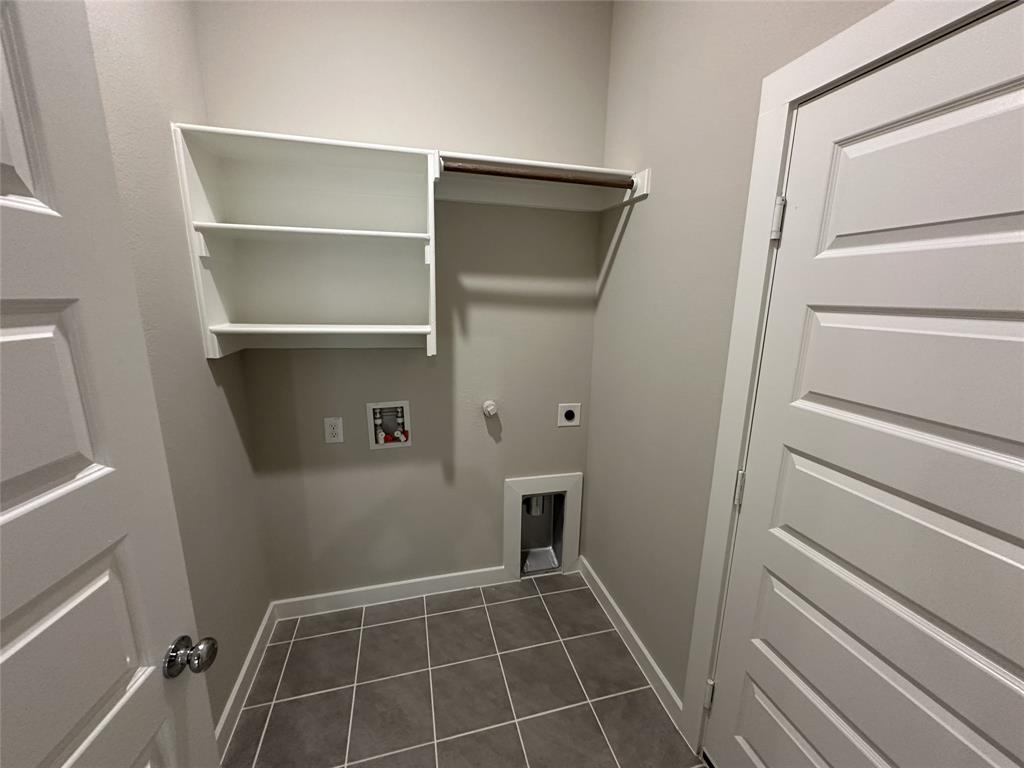 109 Lavender Street Forney, TX 75126 - Photo 5 of 15 a view of an empty walk in closet