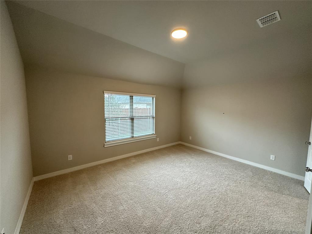 109 Lavender Street Forney, TX 75126 - Photo 6 of 15 an empty room with a window