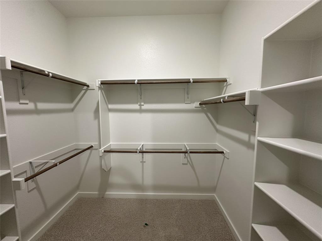 109 Lavender Street Forney, TX 75126 - Photo 10 of 15 a view of an empty walk in closet