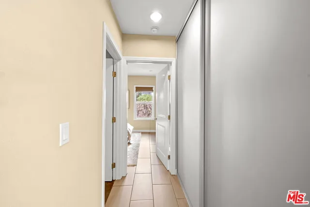 a view of a bathroom from a hallway