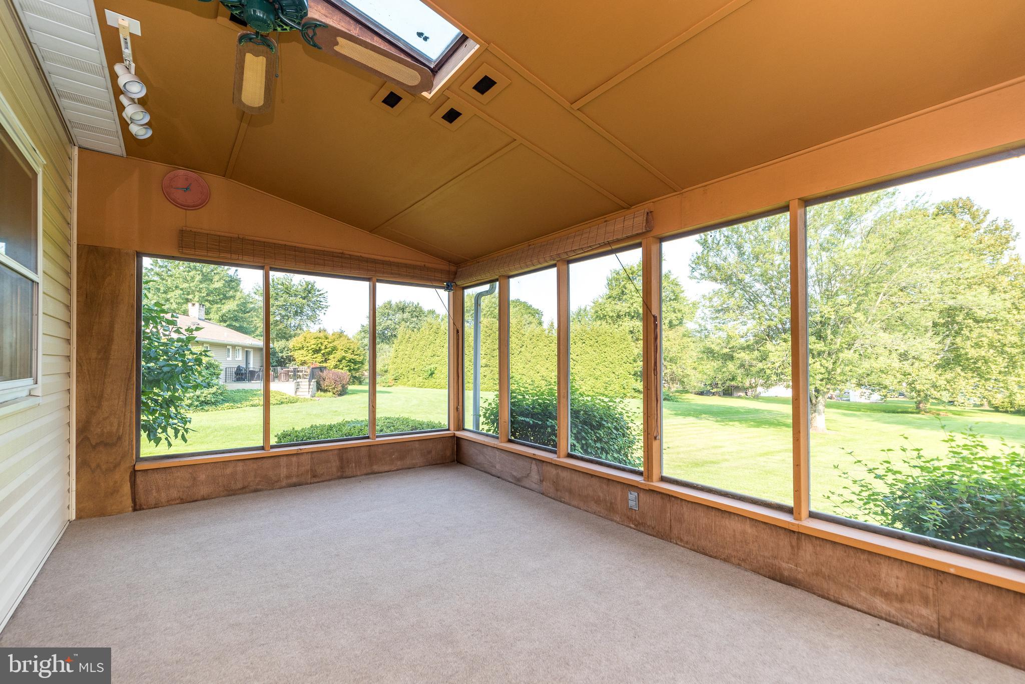 521 Cherry Road Souderton, PA 18964 - Photo 22 of 31 Sunroom w/ Lighting, Ceiling Fan & Skylights