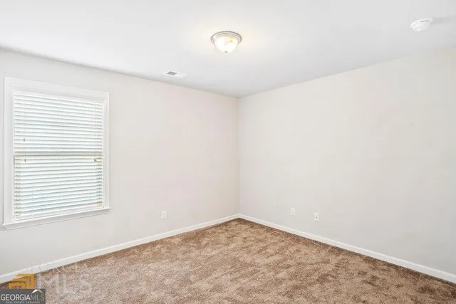 a view of a room with a window