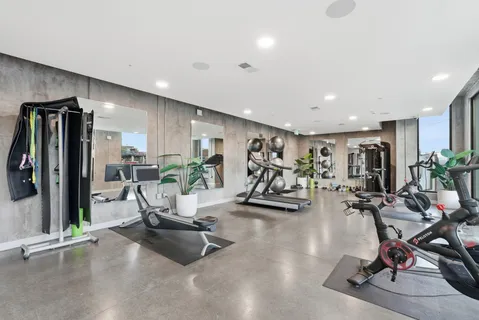 a view of a room with gym equipment