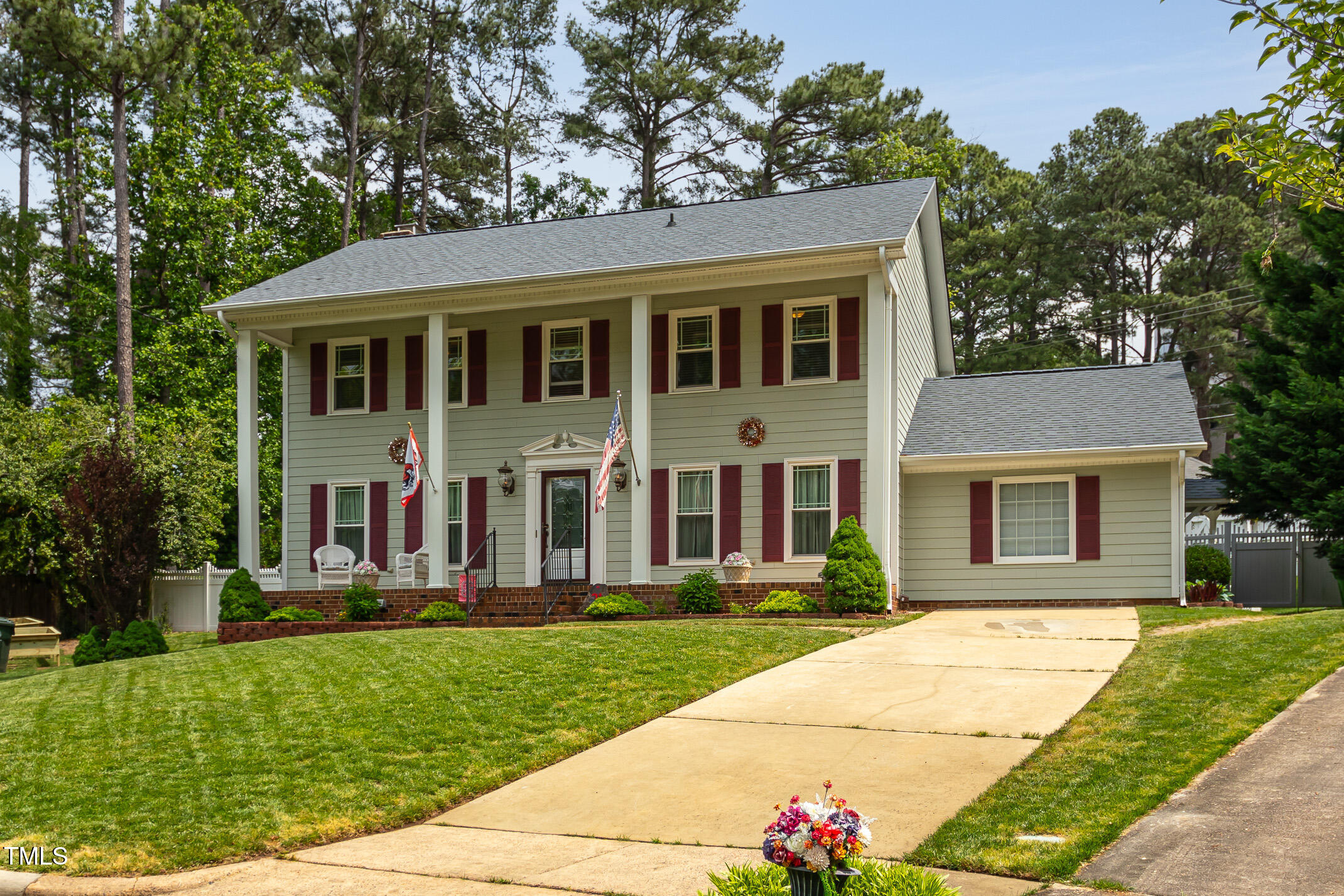 1213 Indian Trail Drive Raleigh, NC 27609 - Photo 1 of 50 front view of a house with a yard