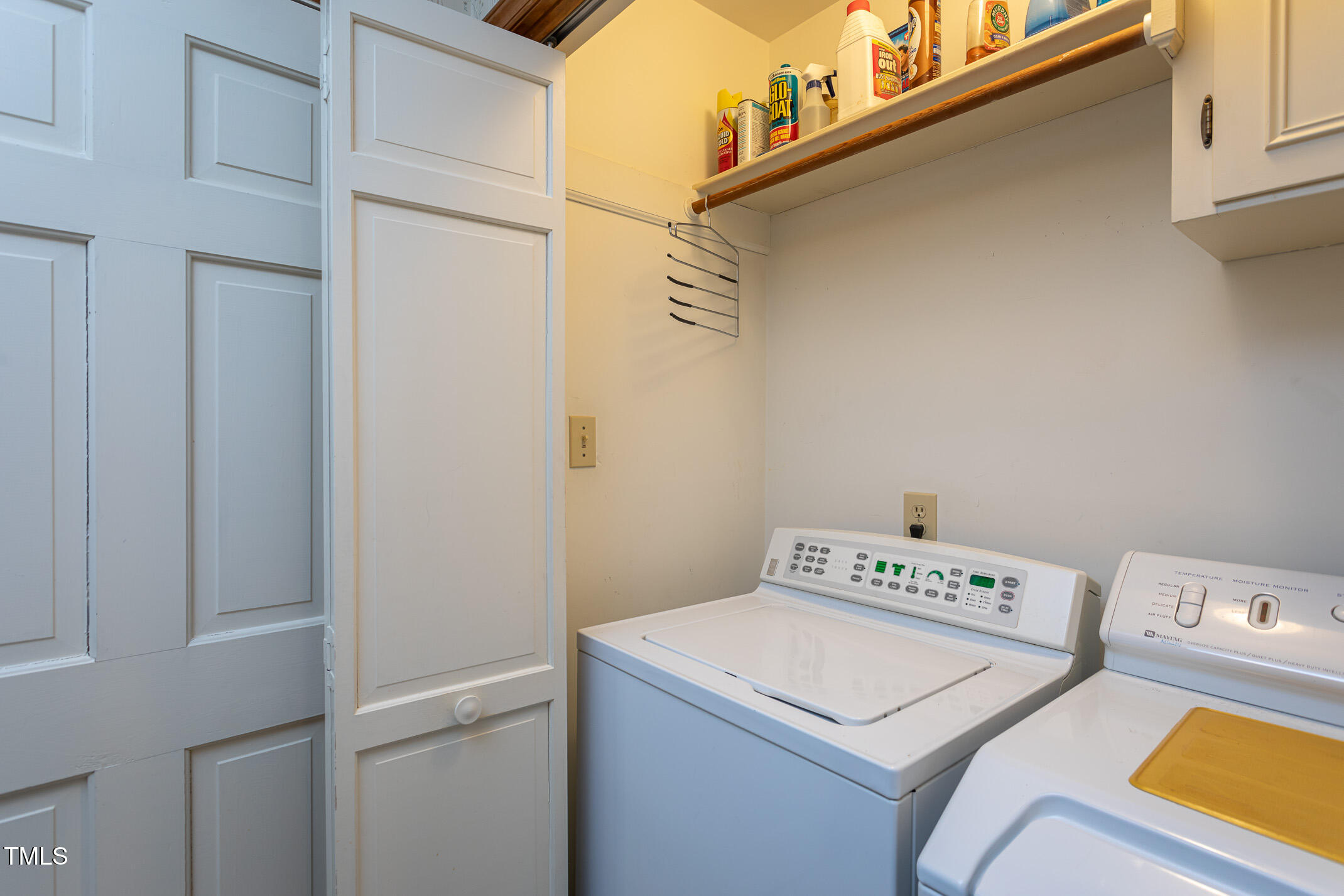 1213 Indian Trail Drive Raleigh, NC 27609 - Photo 11 of 50 a utility room with dryer and washer