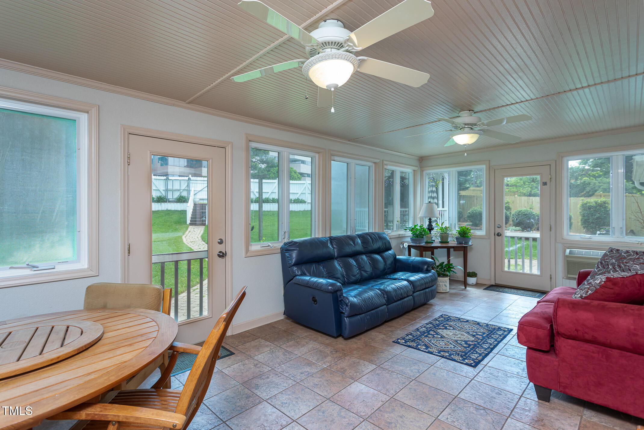 1213 Indian Trail Drive Raleigh, NC 27609 - Photo 29 of 50 a living room with furniture and a potted plant