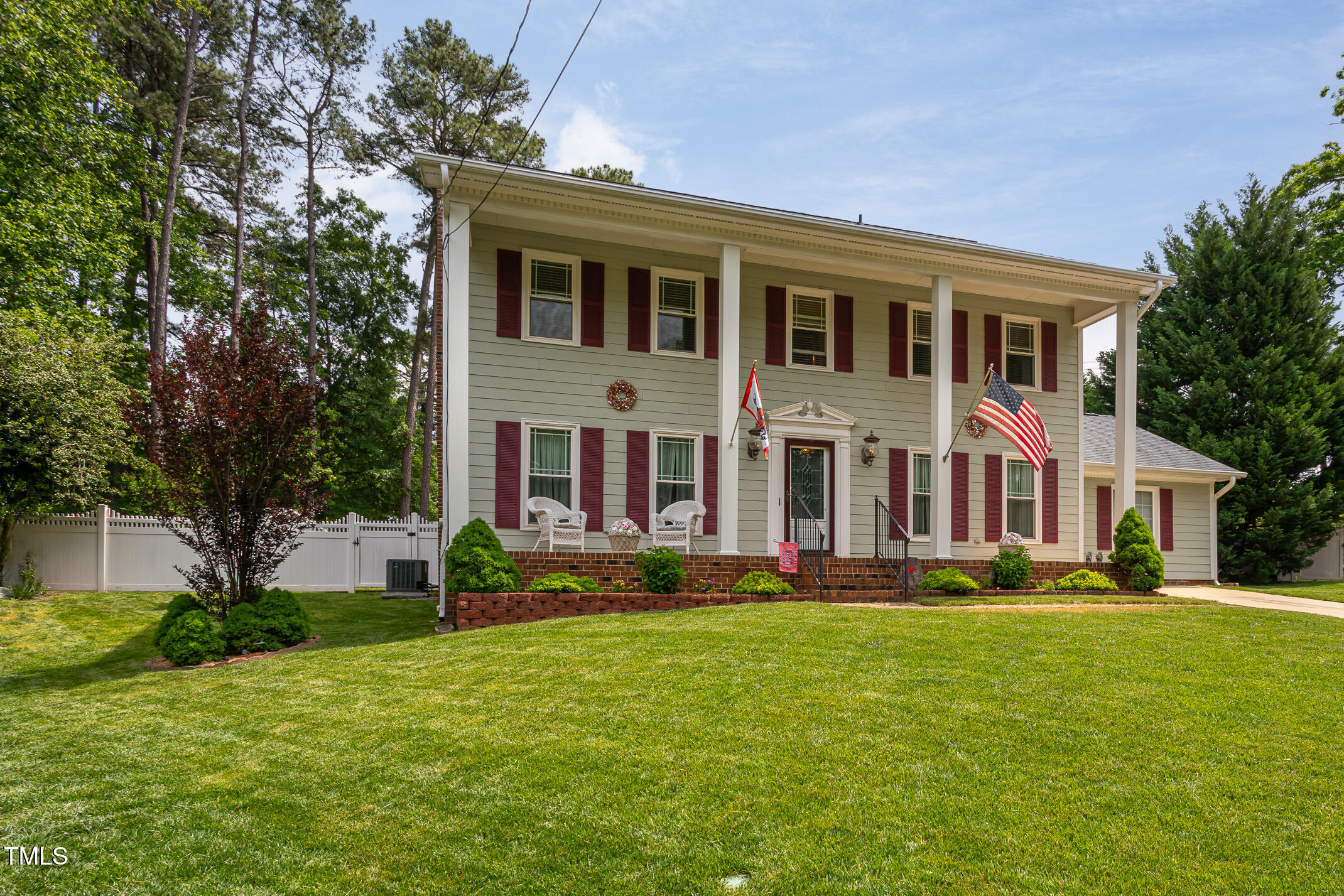 1213 Indian Trail Drive Raleigh, NC 27609 - Photo 3 of 50 a front view of house with yard and green space