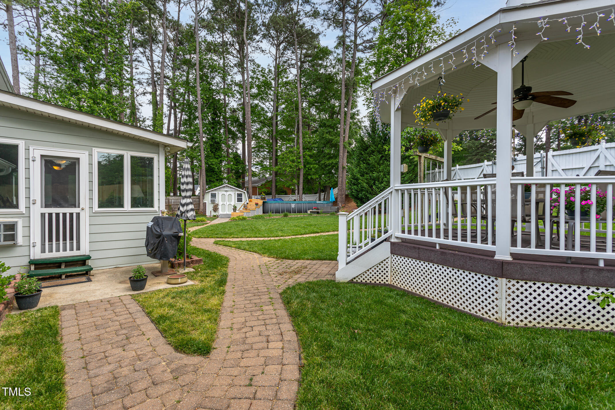 1213 Indian Trail Drive Raleigh, NC 27609 - Photo 31 of 50 a view of a house with a backyard