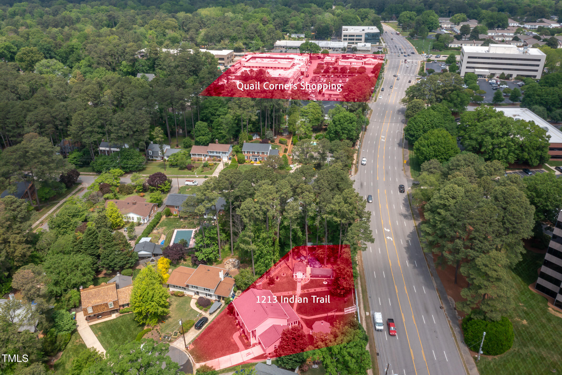 1213 Indian Trail Drive Raleigh, NC 27609 - Photo 41 of 50 an outdoor space with seating area and trees