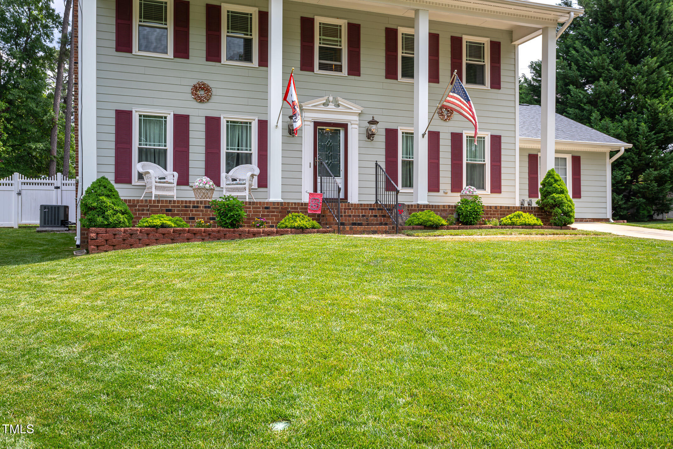 1213 Indian Trail Drive Raleigh, NC 27609 - Photo 42 of 50 front view of a house with a yard