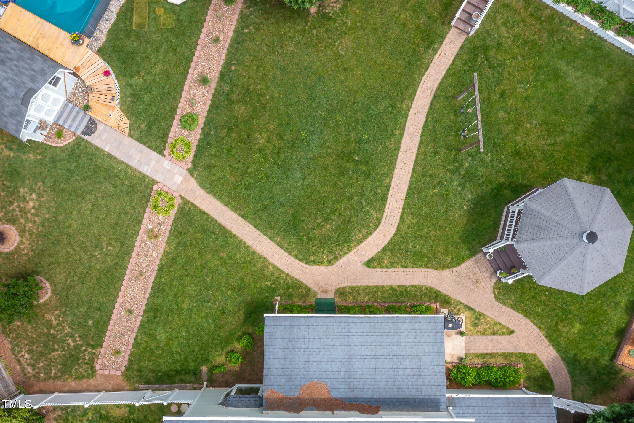 1213 Indian Trail Drive Raleigh, NC 27609 - Photo 46 of 50 an aerial view of a house with outdoor space pool seating area and slide