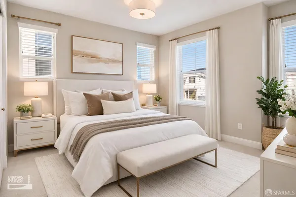 a bed room with a bed and a window