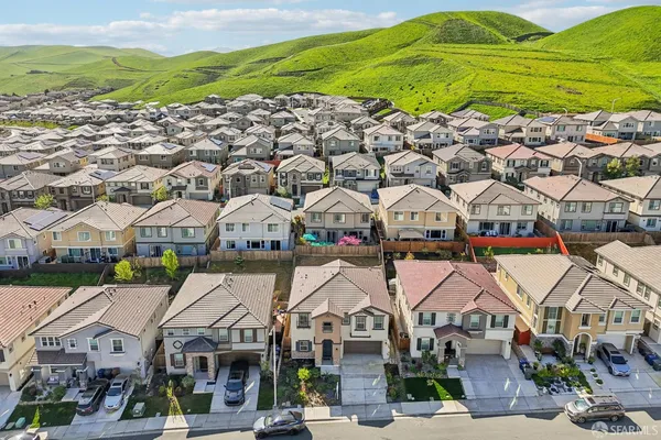 a view of barbeque area with seating