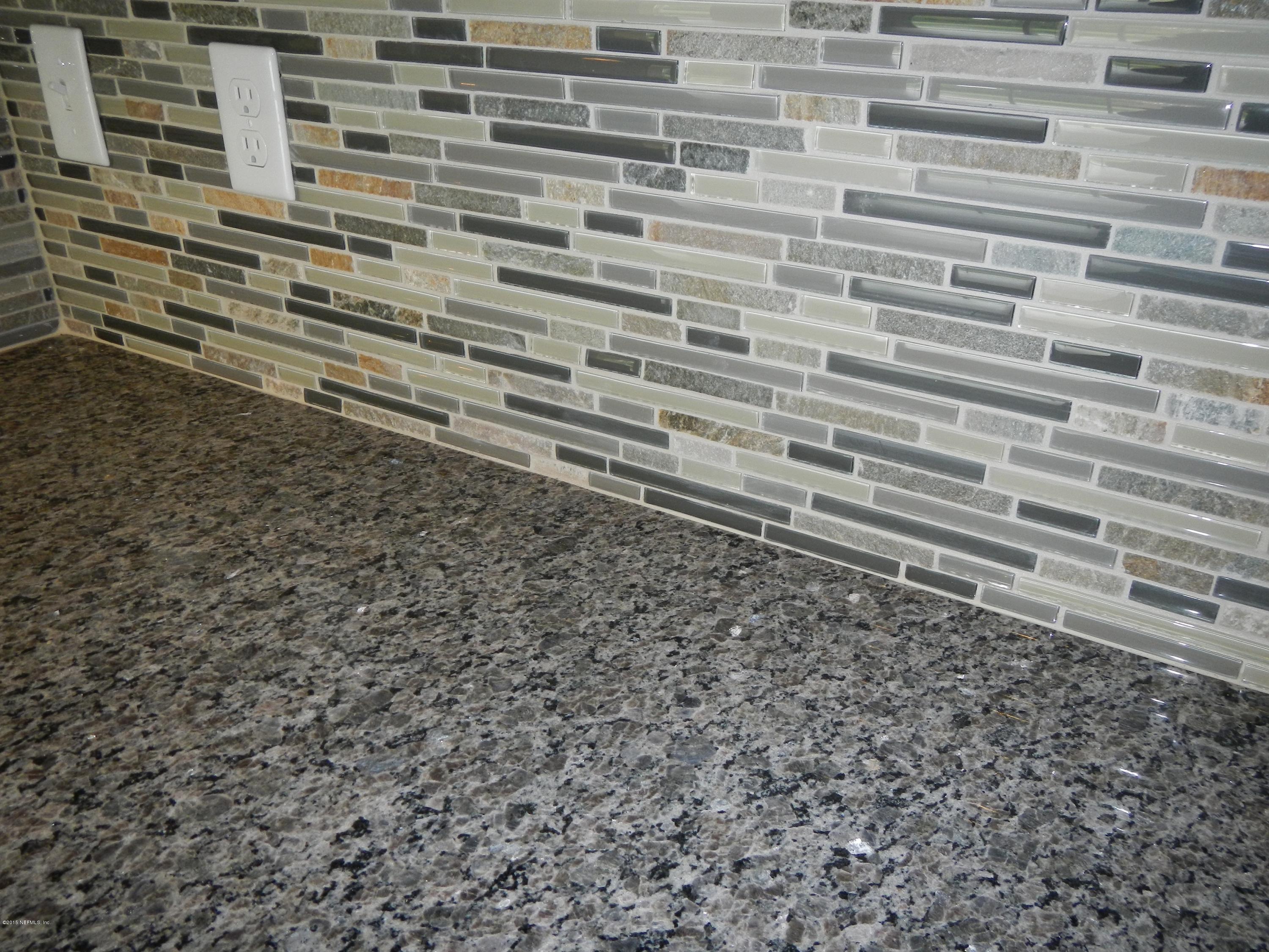3916 Trail Ridge Road Middleburg, FL 32068 - Photo 12 of 32 Backsplash & Counter Close-up.JPG