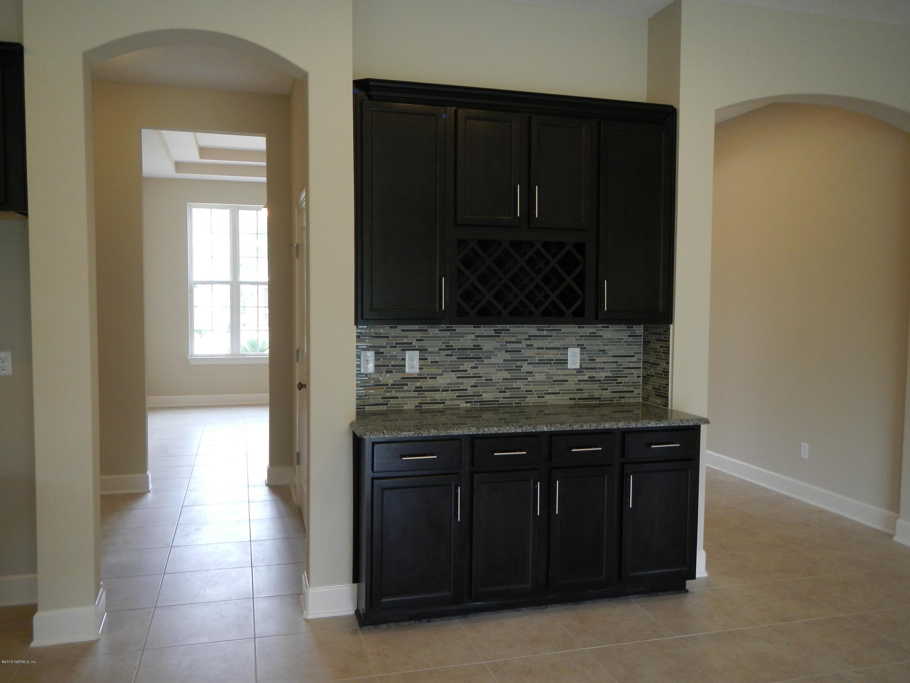 3916 Trail Ridge Road Middleburg, FL 32068 - Photo 9 of 32 Breakfast area & hall to dining.JPG