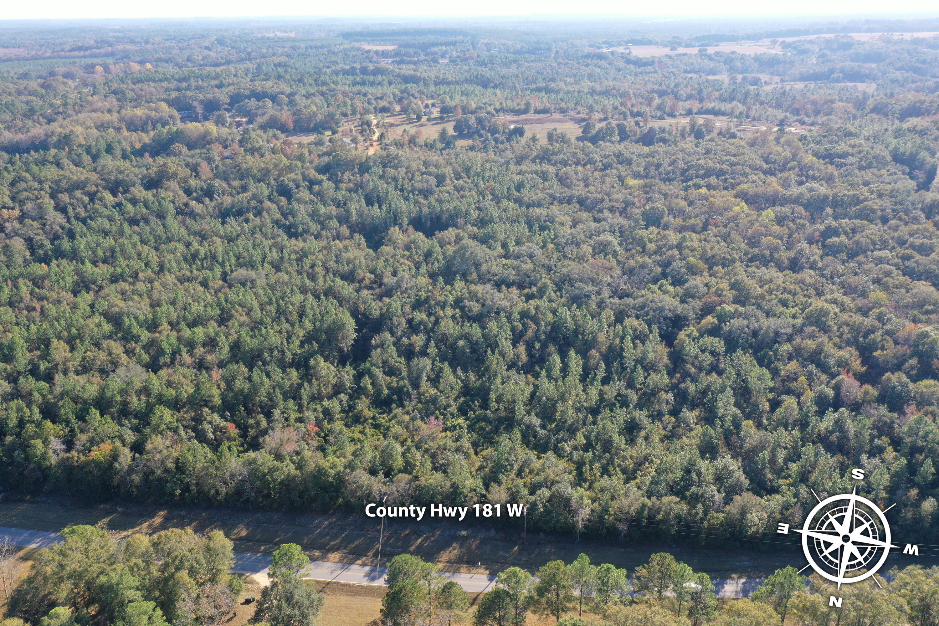 0 West Co Highway DeFuniak Springs, FL 32433 - Photo 9 of 9 an aerial view of residential house with yard and outdoor seating