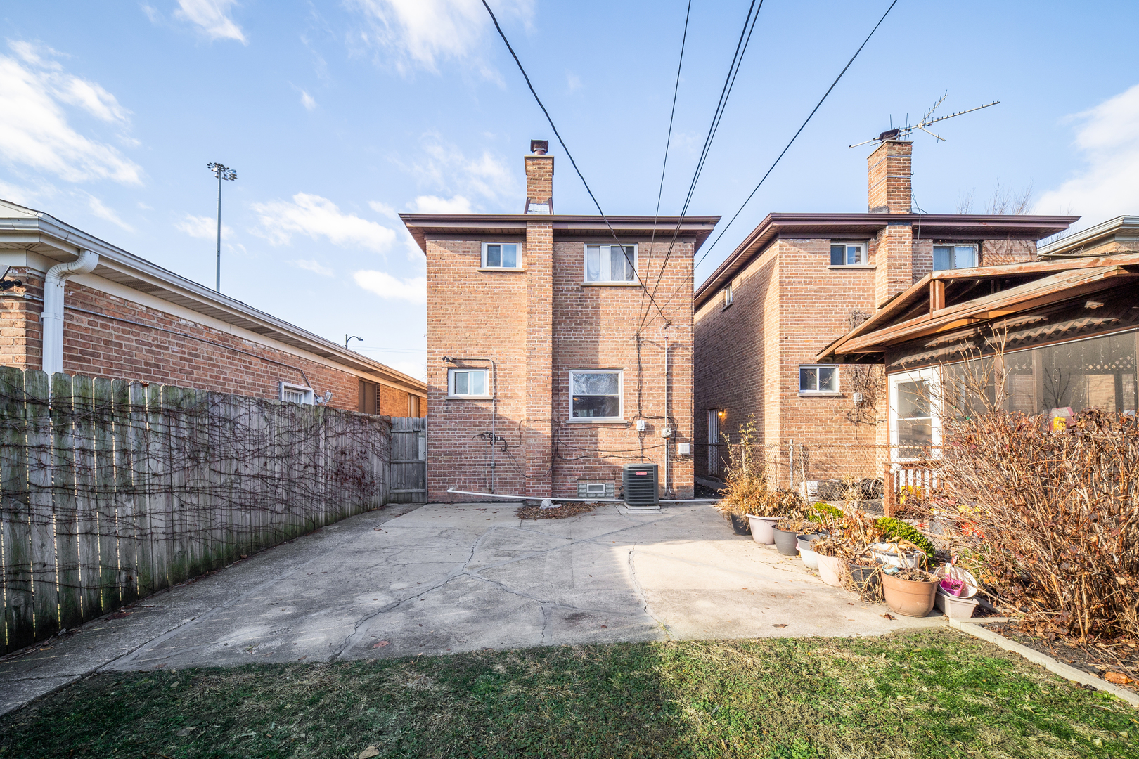 8435 South State Street Chicago, IL 60619 - Photo 15 of 16 a front view of a house with a yard