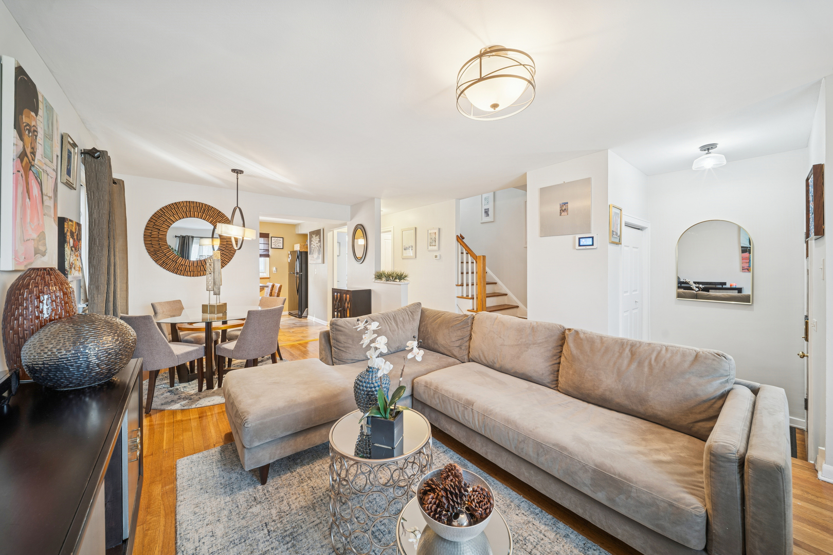 8435 South State Street Chicago, IL 60619 - Photo 2 of 16 a living room with furniture and wooden floor