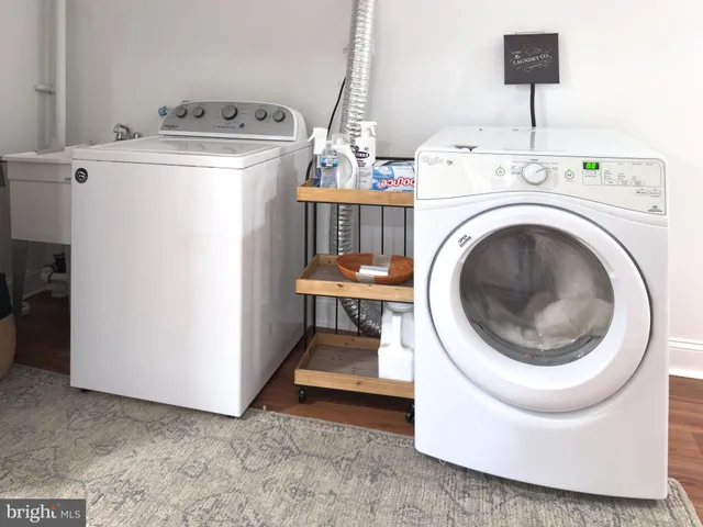 a utility room with dryer and washer