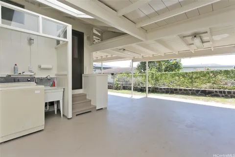 a view of a room with washing machine