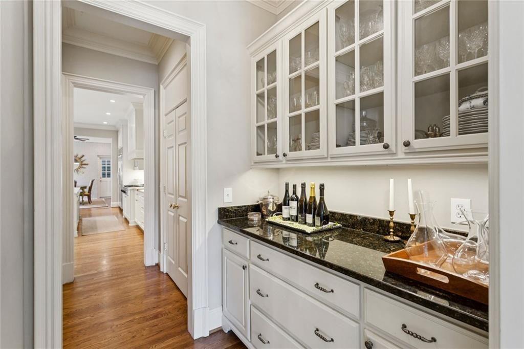 3005 Ranch Road Southeast Atlanta, GA 30339 - Photo 14 of 57 a kitchen with granite countertop a sink stainless steel appliances and cabinets