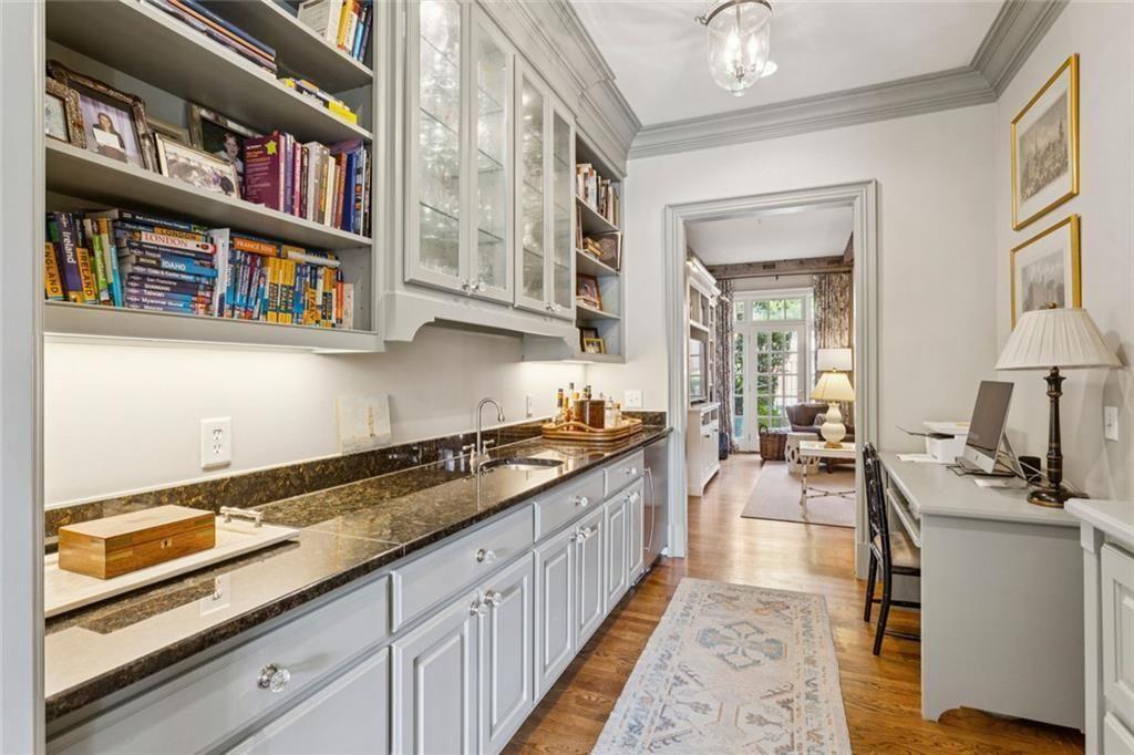 3005 Ranch Road Southeast Atlanta, GA 30339 - Photo 15 of 57 a kitchen with stainless steel appliances granite countertop a stove and cabinets