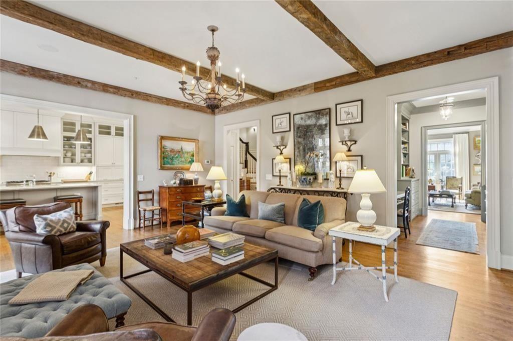 3005 Ranch Road Southeast Atlanta, GA 30339 - Photo 17 of 57 a living room with furniture or outdoor view and a chandelier