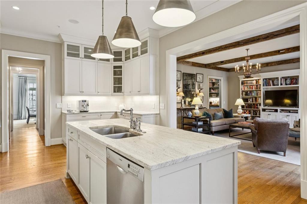 3005 Ranch Road Southeast Atlanta, GA 30339 - Photo 25 of 57 a kitchen with a sink a counter and chairs