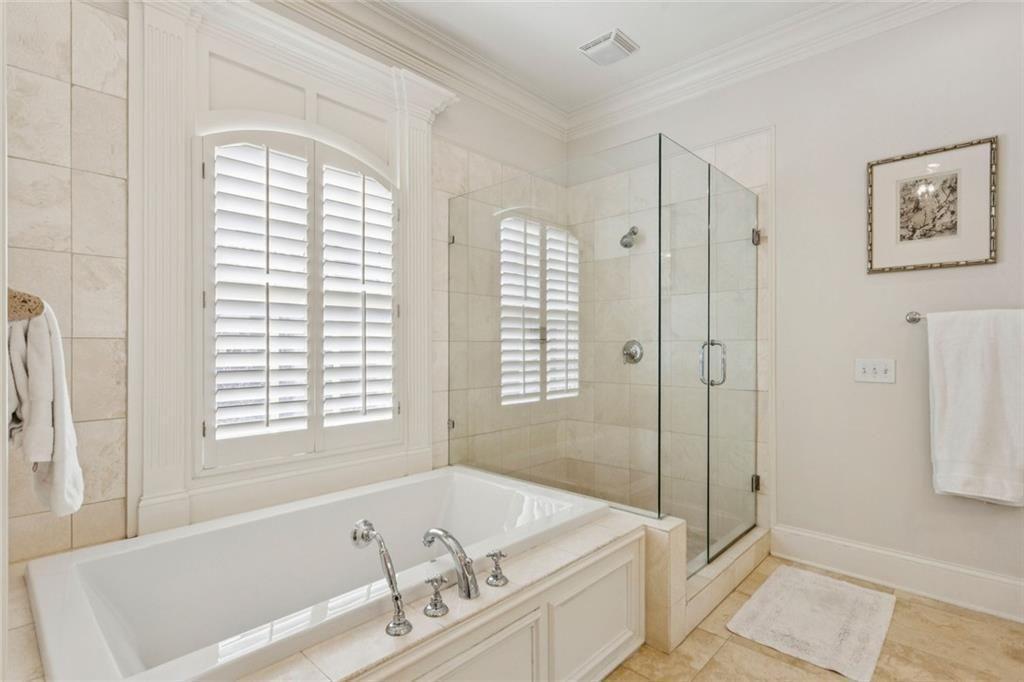 3005 Ranch Road Southeast Atlanta, GA 30339 - Photo 39 of 57 a bathroom with a tub a sink and a shower