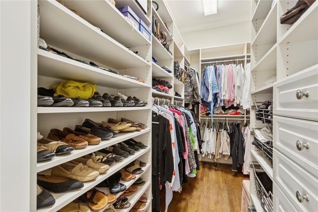 3005 Ranch Road Southeast Atlanta, GA 30339 - Photo 40 of 57 a view of walk in closet with clothes and shoes