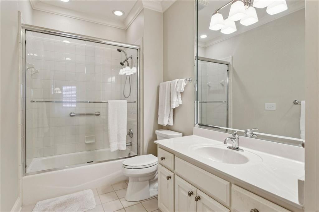 3005 Ranch Road Southeast Atlanta, GA 30339 - Photo 46 of 57 a bathroom with a sink a toilet and shower