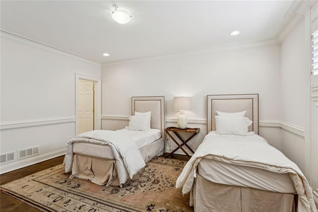 3005 Ranch Road Southeast Atlanta, GA 30339 - Photo 48 of 57 a bedroom with a bed and a night stand