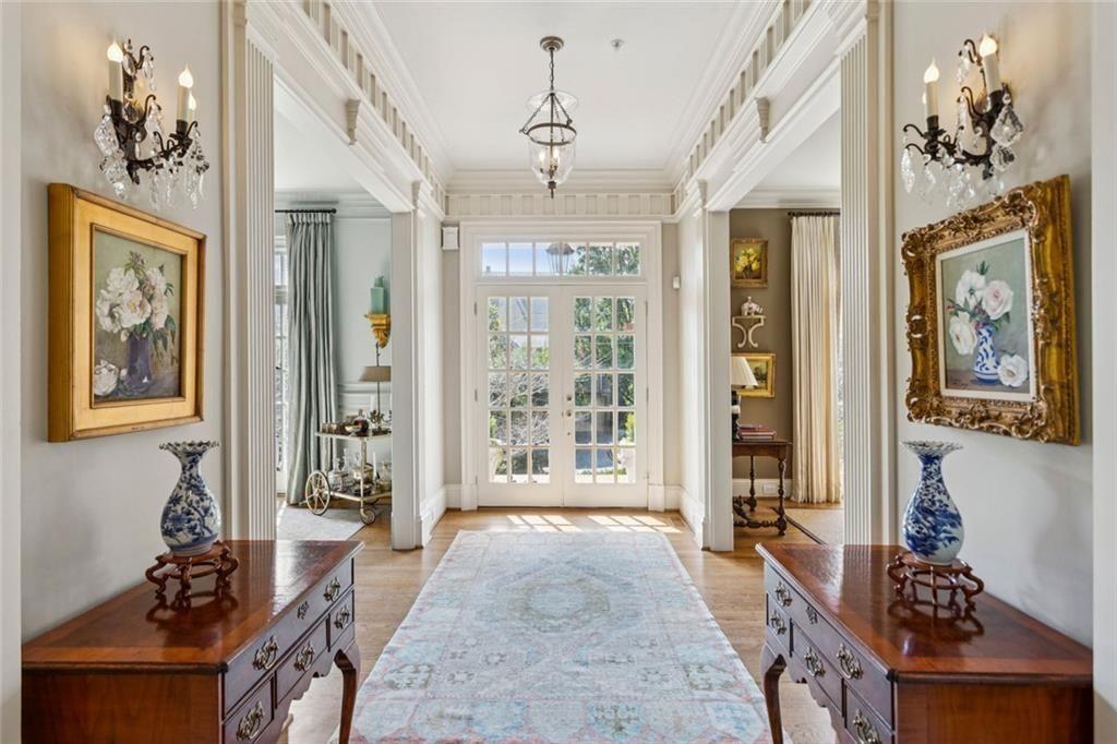 3005 Ranch Road Southeast Atlanta, GA 30339 - Photo 6 of 57 a living room with furniture a chandelier and a window