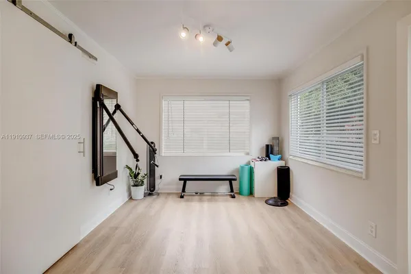 a view of an empty room with a window